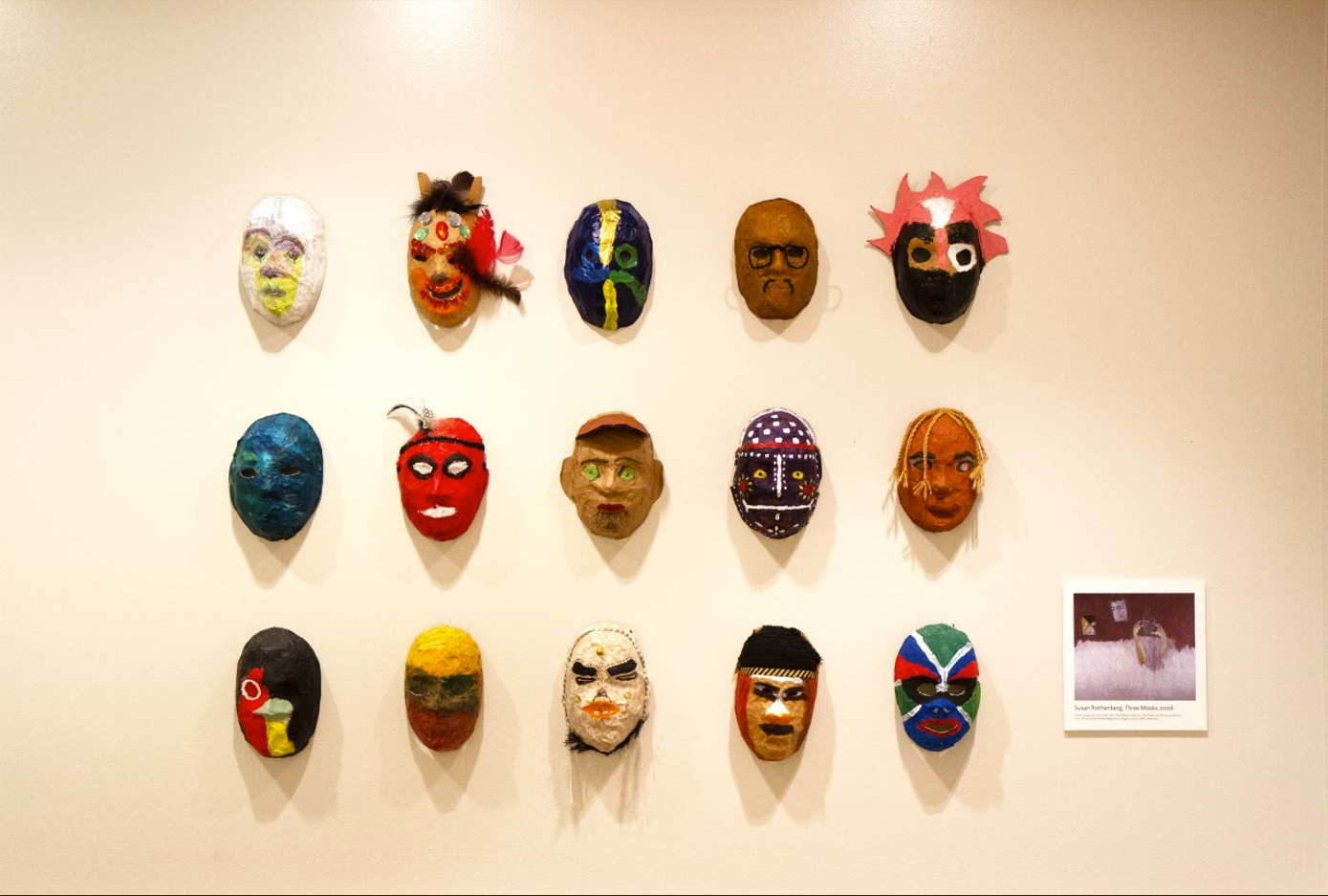 Revealing and  Creating Identity Washington Home Center  The artists pose with their masks. The beauty of the masks  and their creators inspired these studio portraits, which  were designed and photographed by Nephelie Andonyadis.