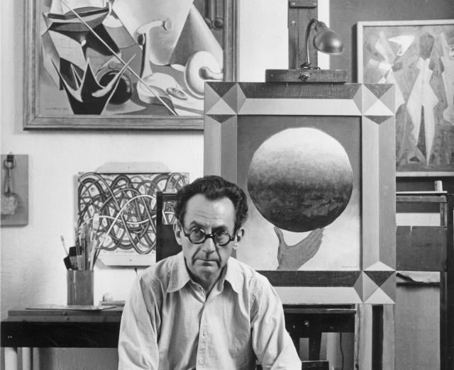Man Ray in his studio