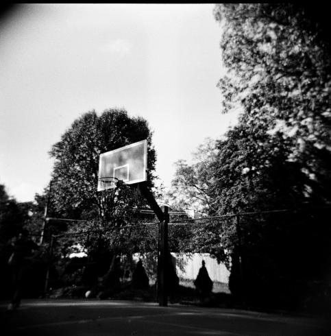 Black and white image of a basketball hoop 