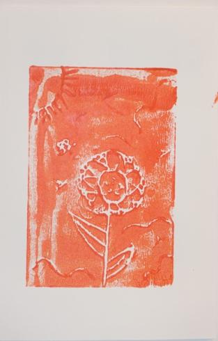 Orange print of a bee and flower in the sun.