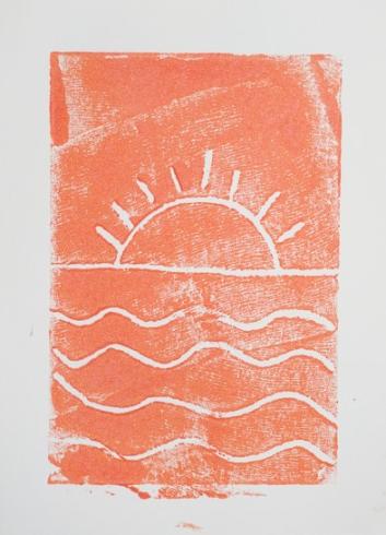 Orange print with the sun setting in the ocean.