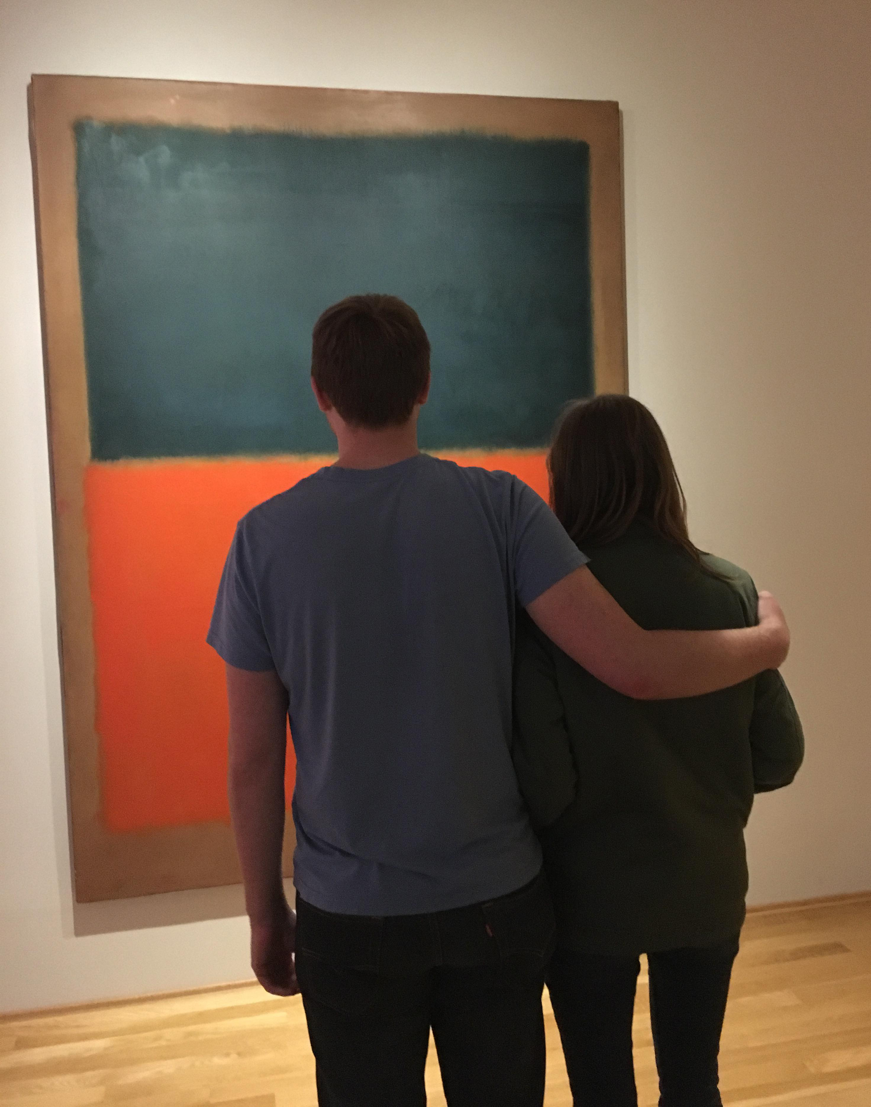 couple in front of a Rothko painting