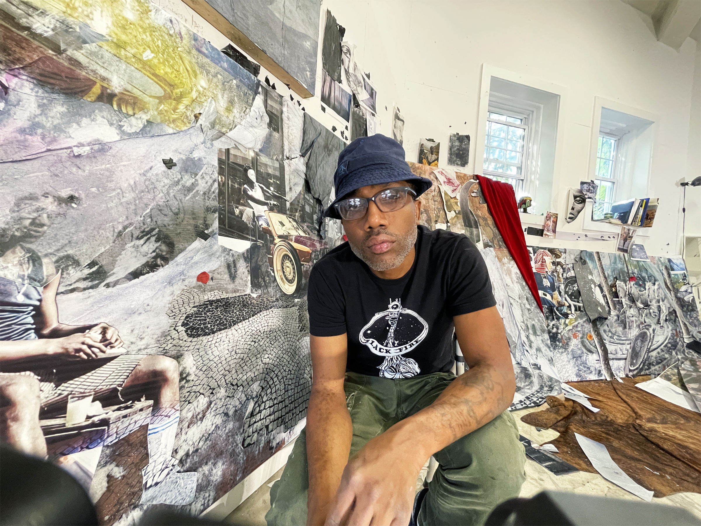 Photograph of Shaunte Gates in his art studio