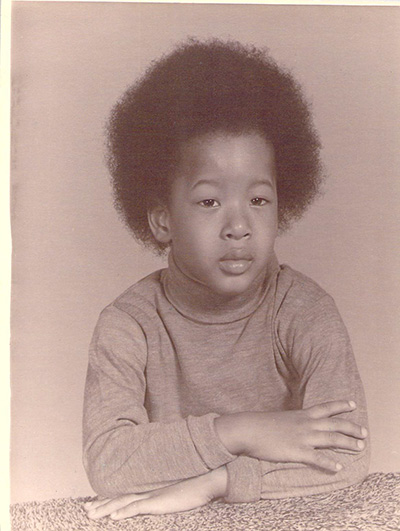 Vintage photograph of Jeff Whitelow as a child in sepia tones