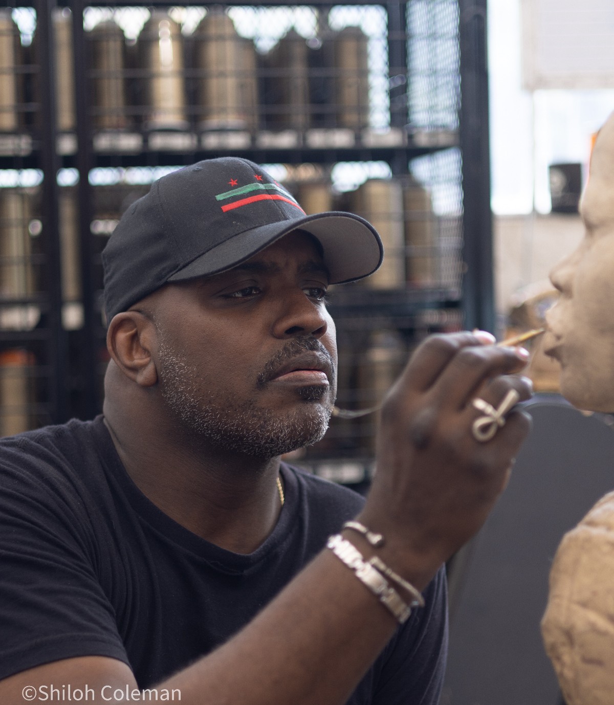 Jay F. Coleman creating a sculpture
