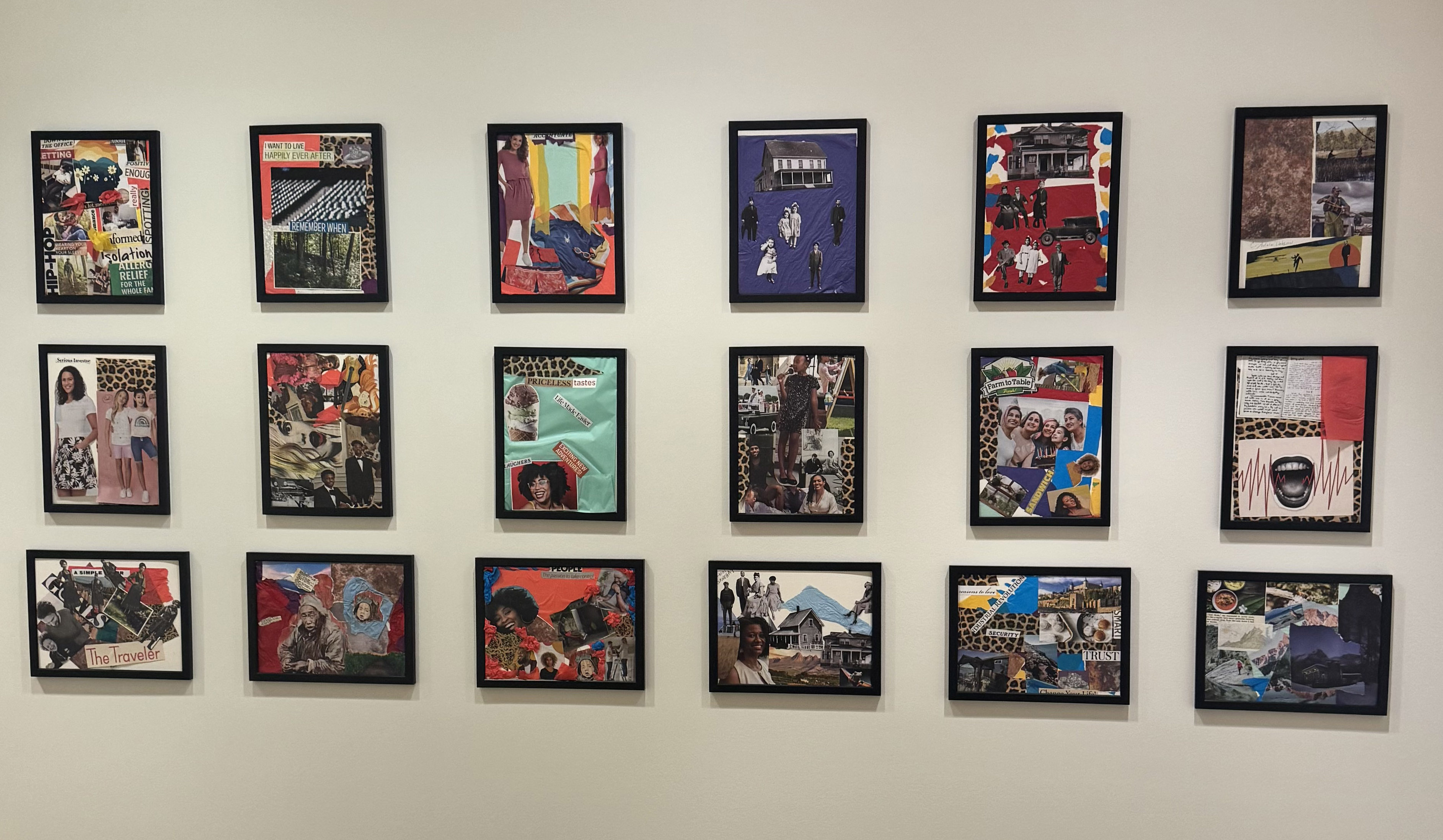 18 framed artworks displayed on a wall