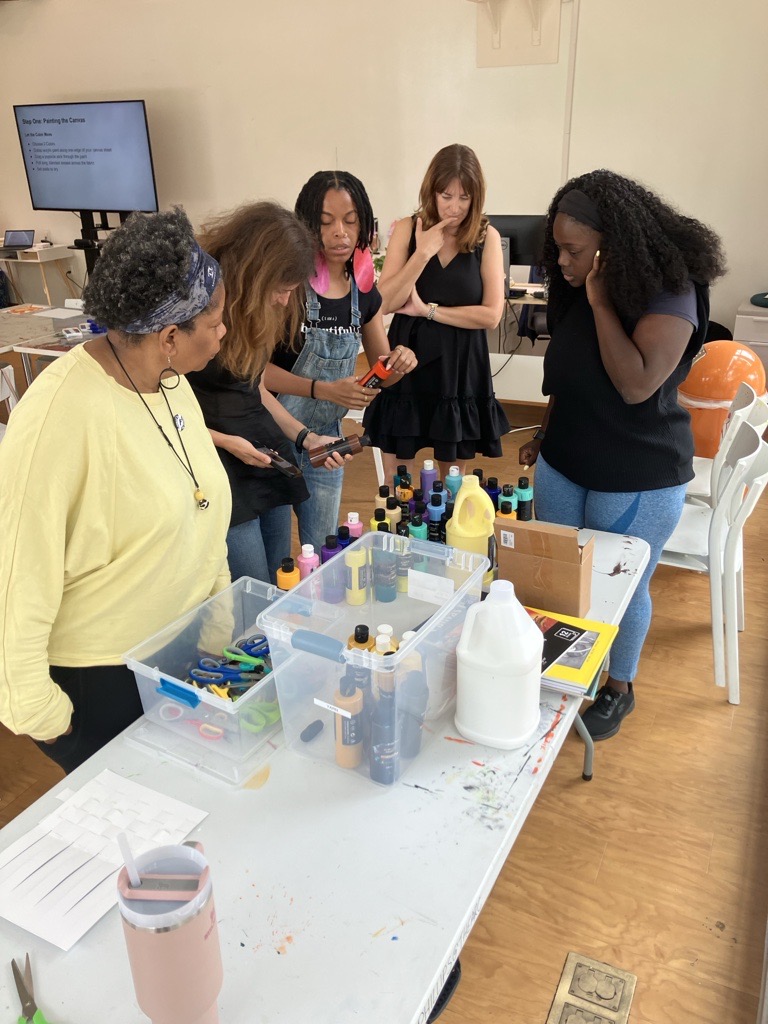 People participating in an art-making workshop at Phillips@THEARC