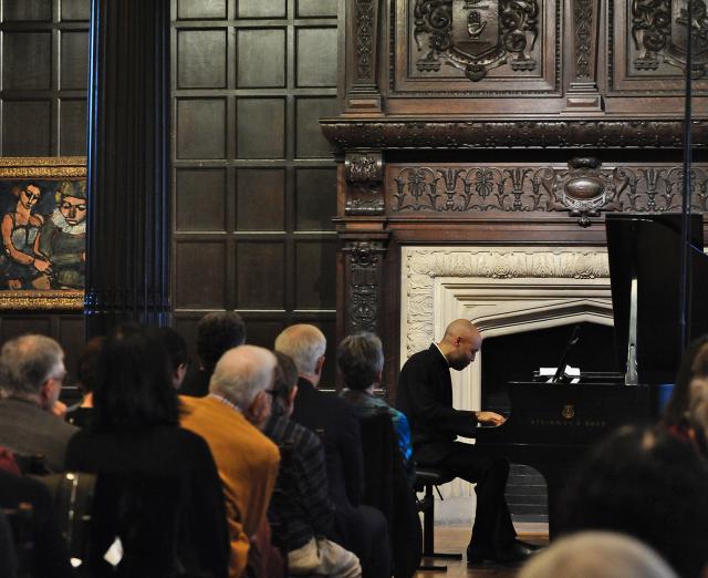 Aaron Diehl performing on the piano in the Music Room