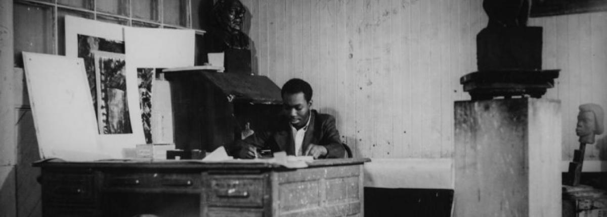 man sitting at his desk