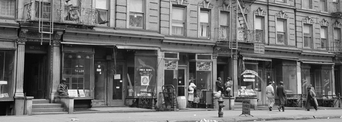 Black and white photograph of Harlem apartments from the 1940s