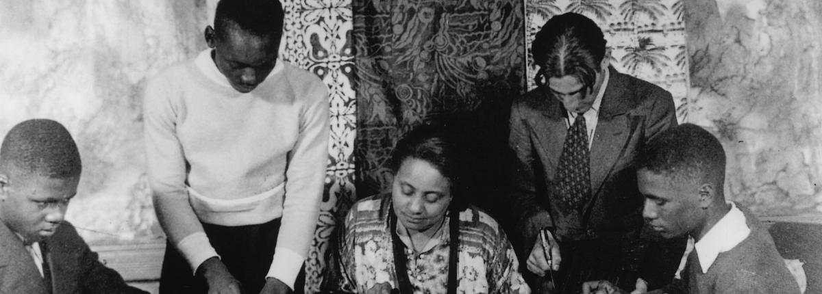 Photograph of Jacob Lawrence making block prints at WPA Federal Art Project Workshop, 1933-34