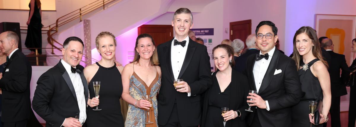 Group of seven people in black tie at The Phillips Collection gala