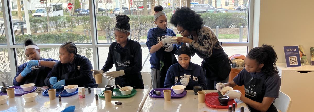 group of students working in THEARC art workshop