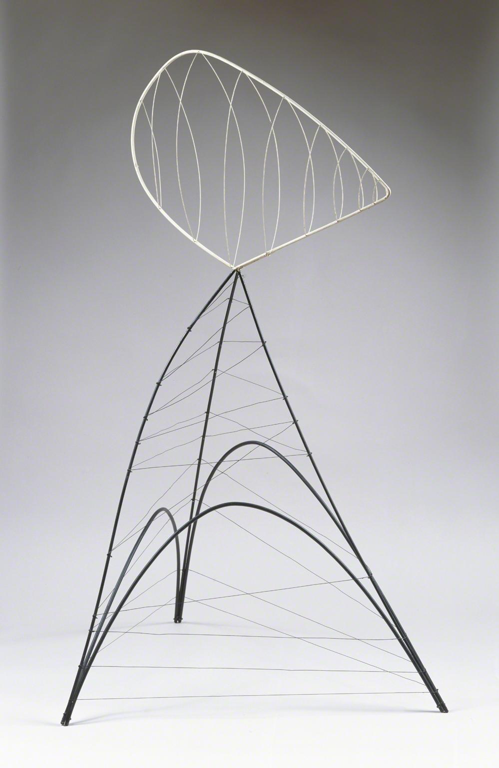A sculpture made of wire with white shape on the top and black on the bottom