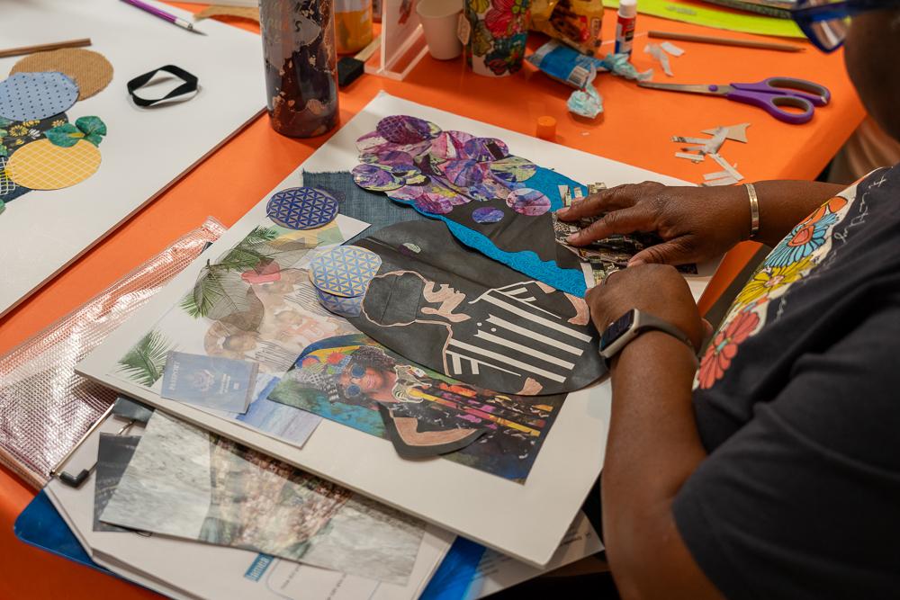 Photograph of a person making a collage