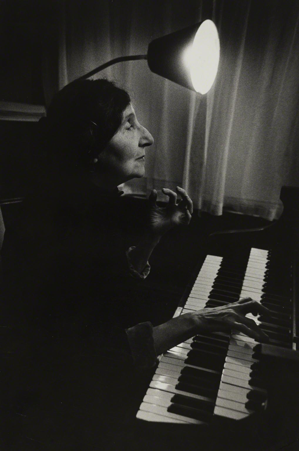 W. Eugene Smith, Wanda Landowska, 73, playing first book of Bach’s Well-Tempered Clavier on the harpsichord in her Connecticut home, 1947.