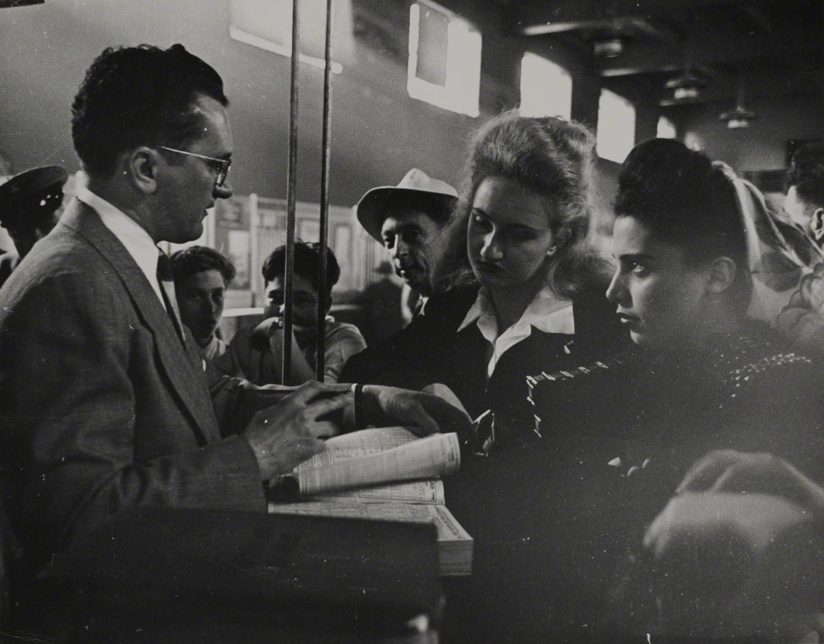 Esther Bubley, At the Terminal Information Desk, 1947.