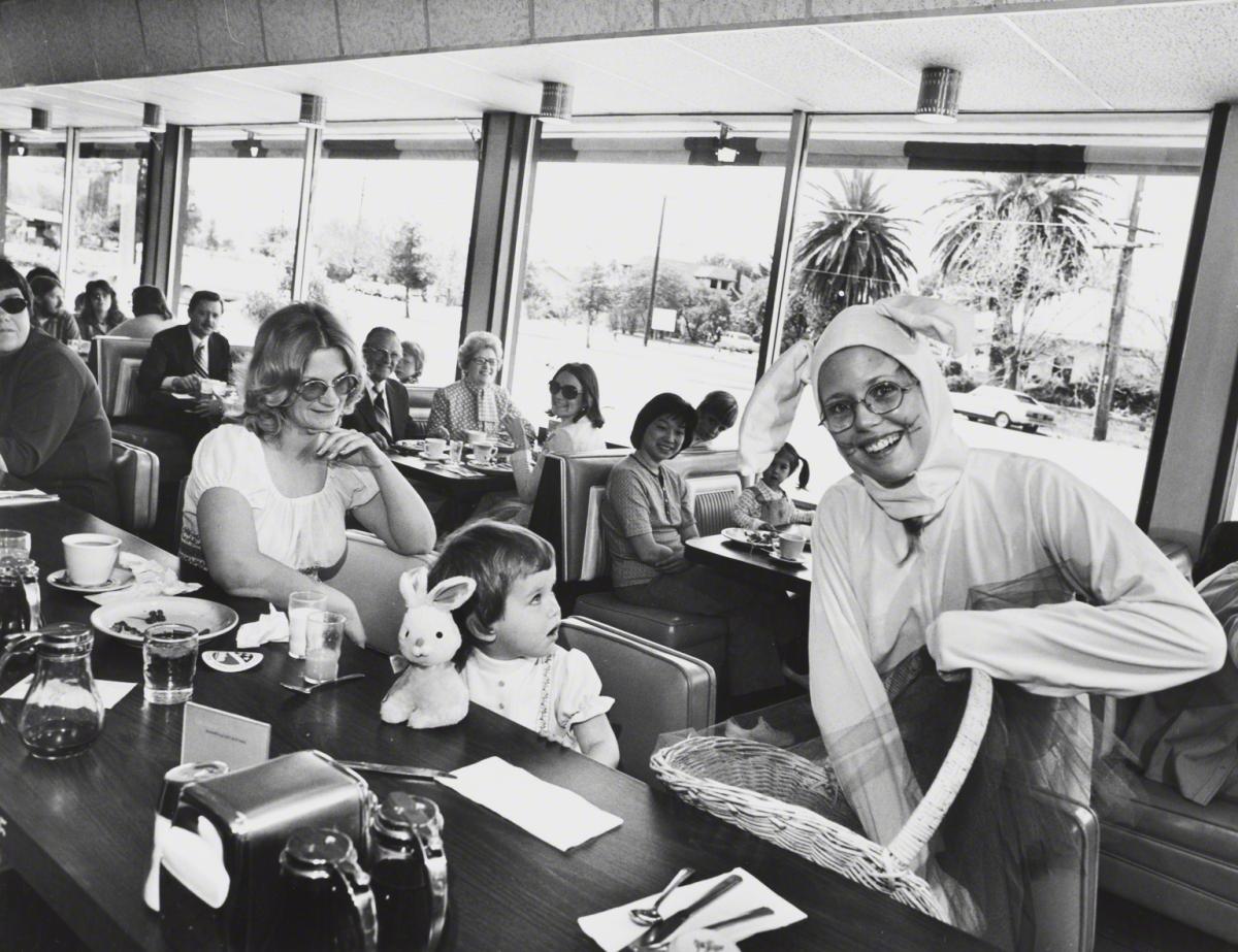 Bill Owens, Untitled (Easter bunny at coffee shop), c. 1972.