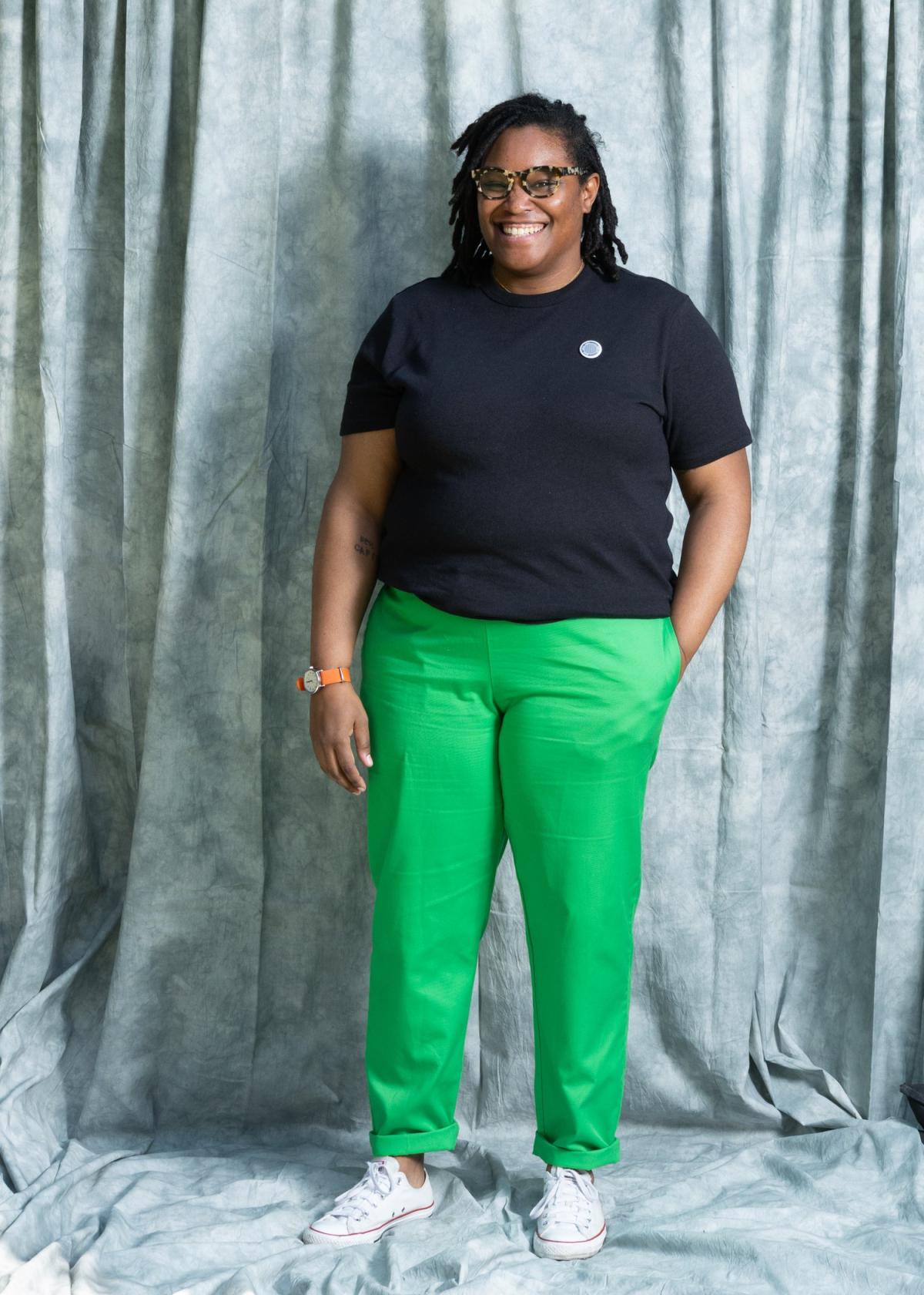 keondra bills freemyn standing and smiling with hand in her pocket