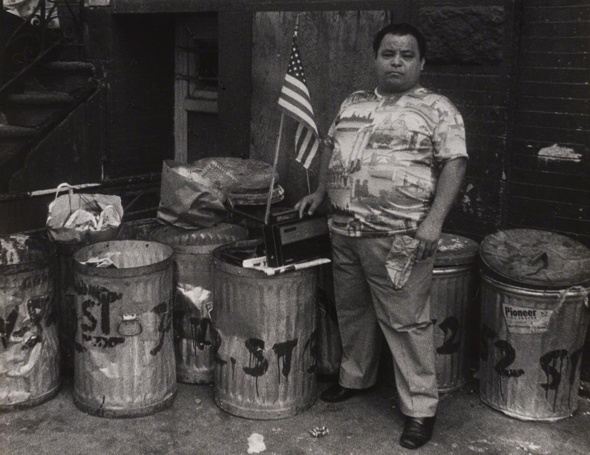 Leon Levinstein, Untitled (flag and garbage can), not dated.