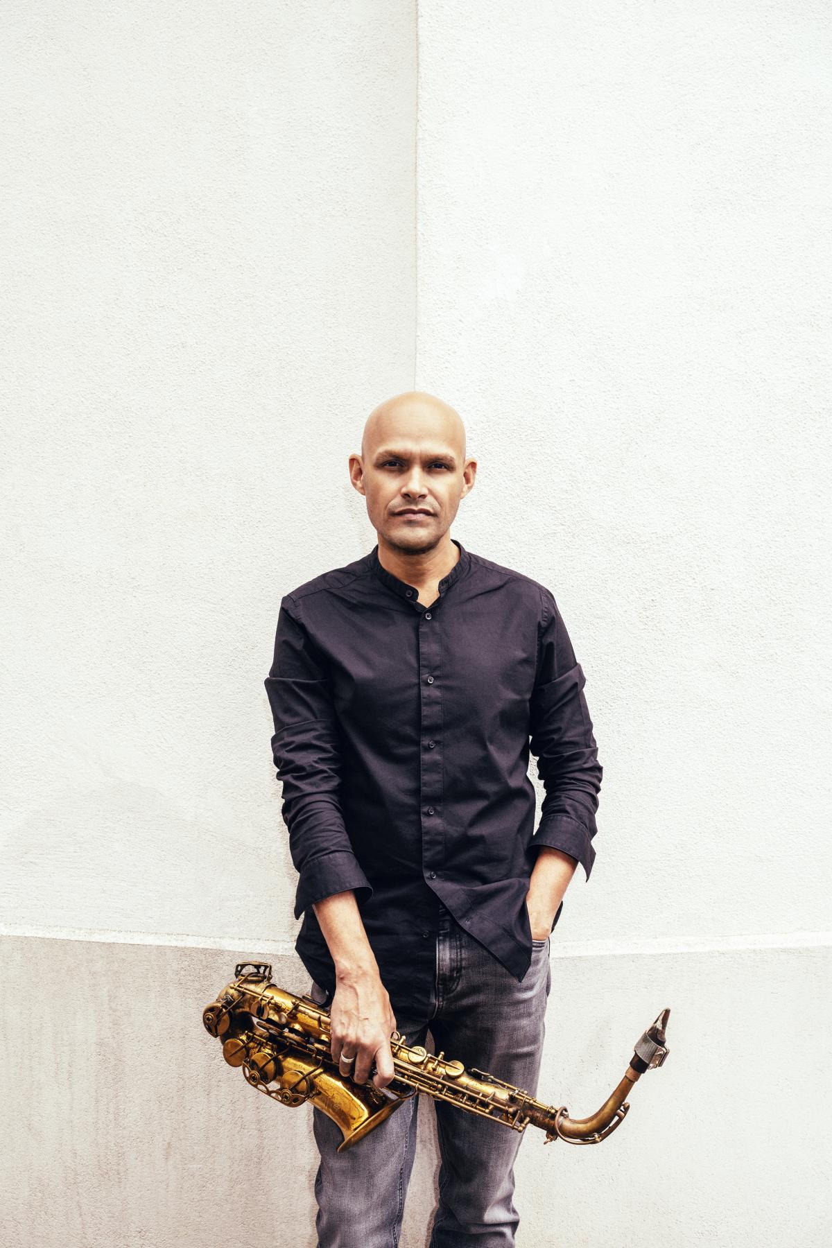 Miguel Zenon holding a saxophone
