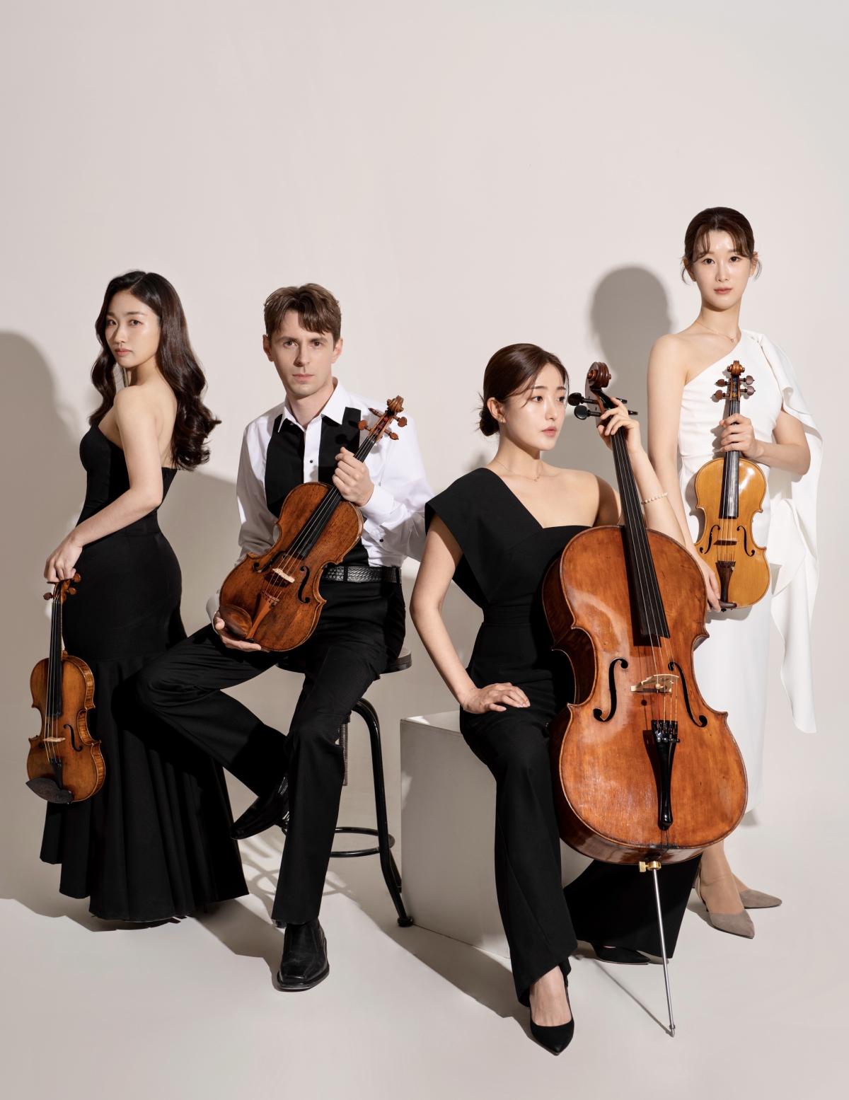 Esme Quartet holding instruments