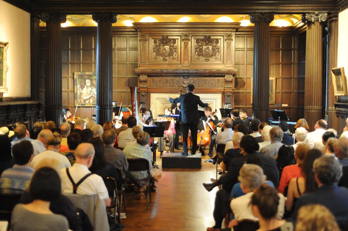 Photograph of Phillips Music Room performance with seated audience