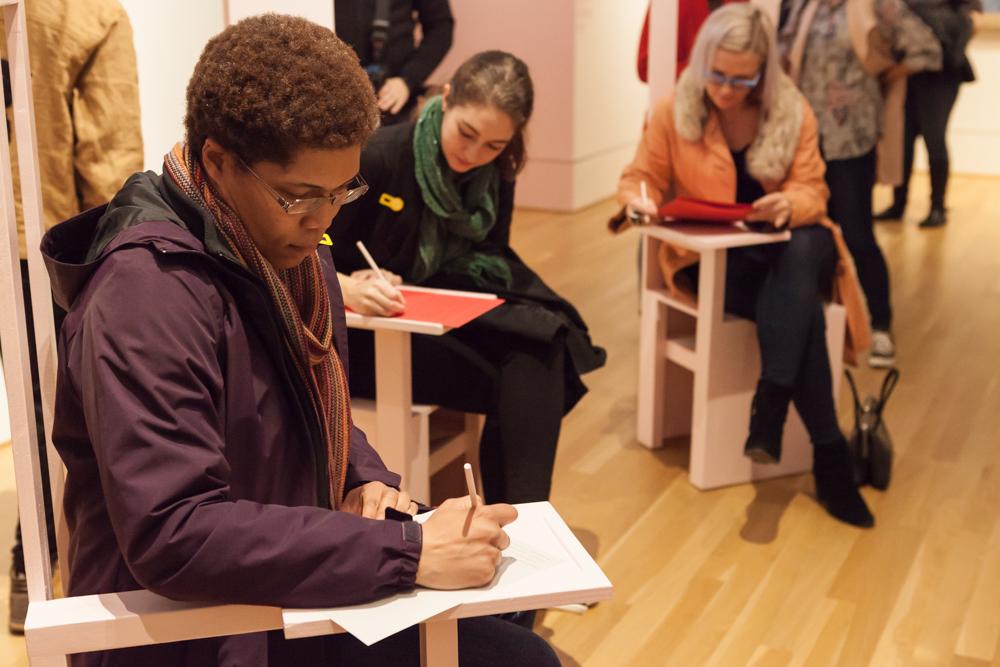 Visitors writing letters