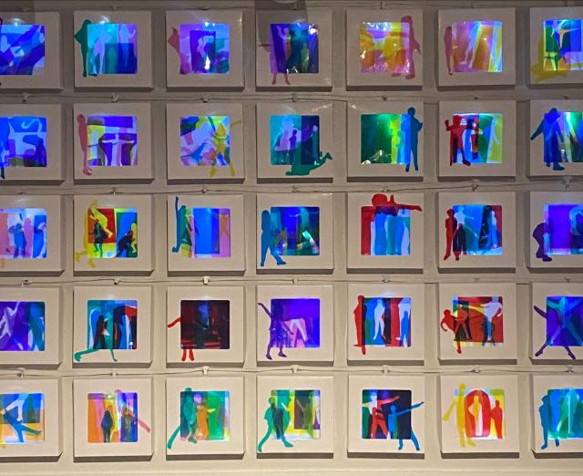 Colorful lightboxes with silhouettes 