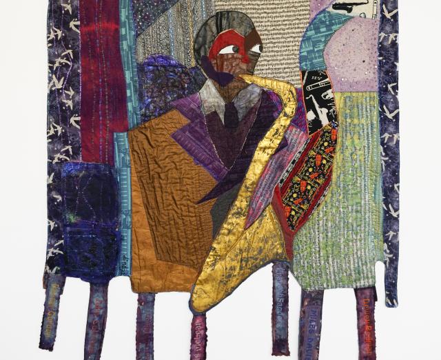 quilt of an abstract man playing the trumpet
