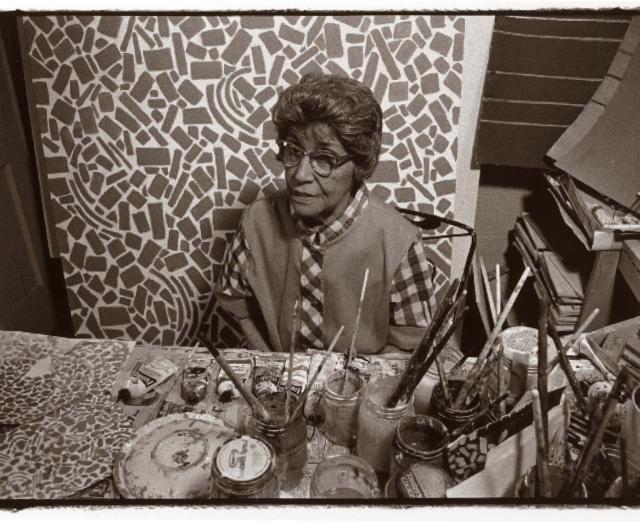 Black and white photograph of Alma Thomas in her studio by Frank Stewart