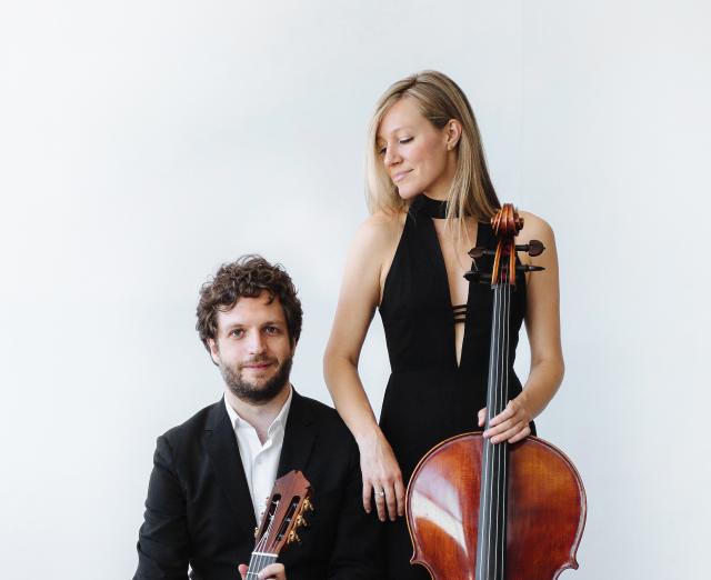 Boyd Meets Girl holding guitar and cello