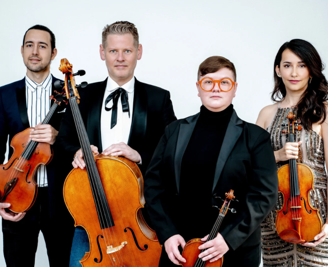 Photo of Catalyst Quartet holding instruments
