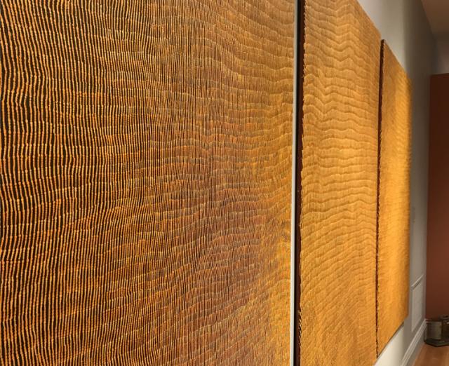 Installation view of Yukultji Napangati’s “Women’s Ceremonies at Marrapinti” (2015)