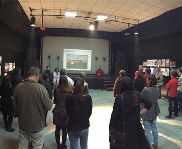 Artists, friends, and family gather at an exhibition of work inspired by Jacob Lawrence's The Migration Series in Mostar.
