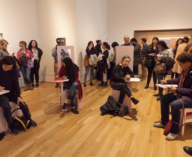 Visitors write letters for the To Future Women project at The Phillips Collection