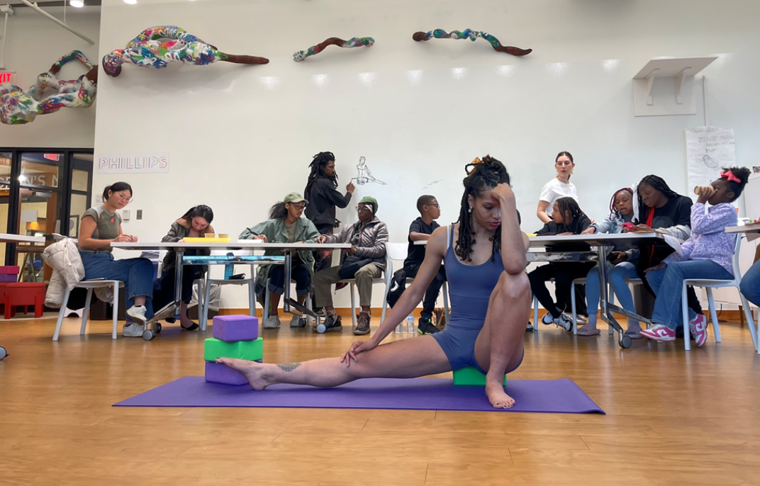 A dancer poses during a live drawing class at Phillips@THEARC. 