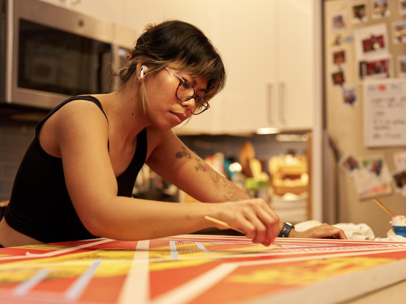 artist working on canvas