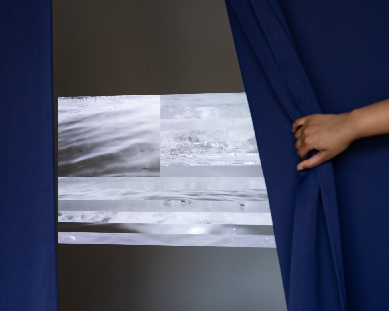 Video installation, indigo dyed curtains, and framed texts