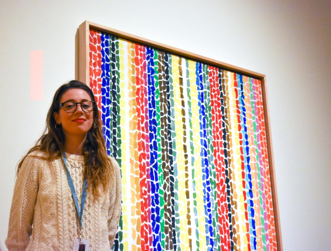 Kathryn Heine, photographed by Kabrea Hayman in front of Alma Thomas' "Breeze Rustling Through Fall Flowers", 1968, 57 7/8 x 50 in.; Acrylic on canvas; The Phillips Collection; Gift of Franz Bader, 1976