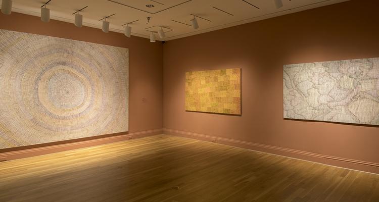Installation view of works by Regina Pilawuk Wilson in Marking the Infinite.