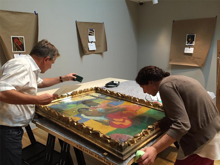 Paul Gauguin's NAFEA faaipoipo (When Will You Marry?) gets an inspection before hanging in in the Phillips's galleries.