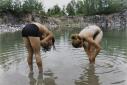 Sarah Anne Johnson, The Bathers (Tree Planting project), 2004.