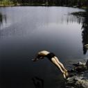 Sarah Anne Johnson, Untitled (Jumping into Lake) (Tree Planting project), 2003.