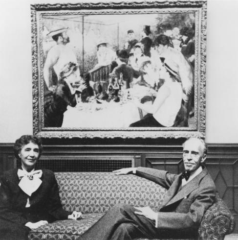 Photograph of Marjorie and Duncan Phillips with Renoir's Luncheon of the Boating Party c. 1954