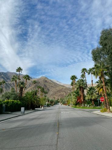 Photograph of empty road and blue skies in Palm Springs California