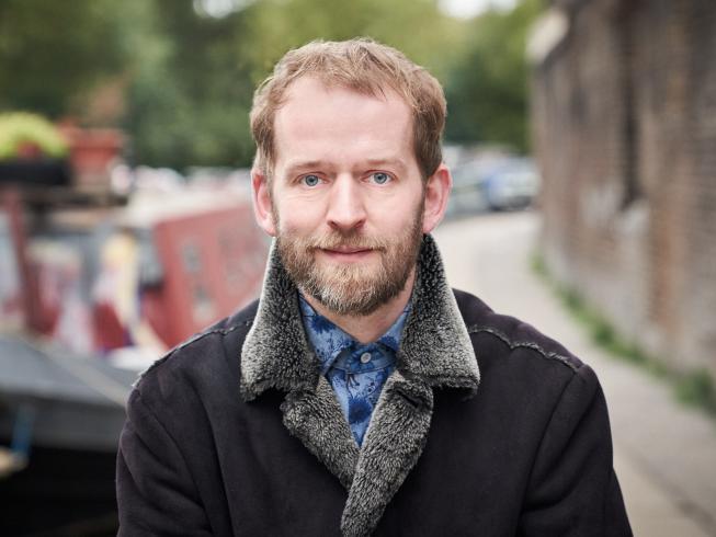 Close-up photo of pianist Alasdair Beatson 