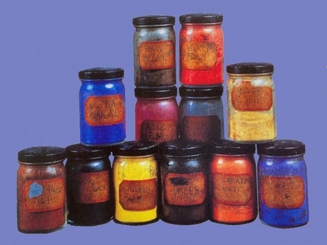 Photograph of a stack of pigment that Jacob Lawrence used to paint the Migration Series 