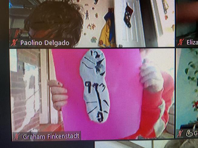 Screenshot of student showing their Dali inspired class on Zoom. 