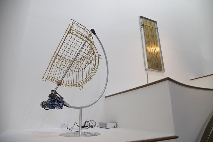 Photograph of two artworks made of brass rods on the Phillips's Goh Annex stairway